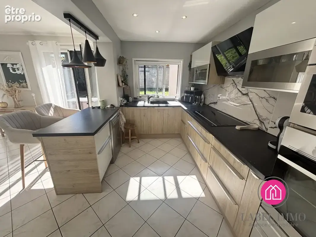 Maison 5 pièces 95 m² à vendre à Saint-Saulve (59880) - photo 4