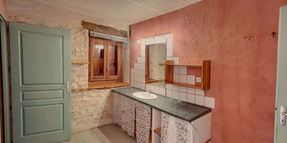 Maison à CASTELNAU-MONTRATIER