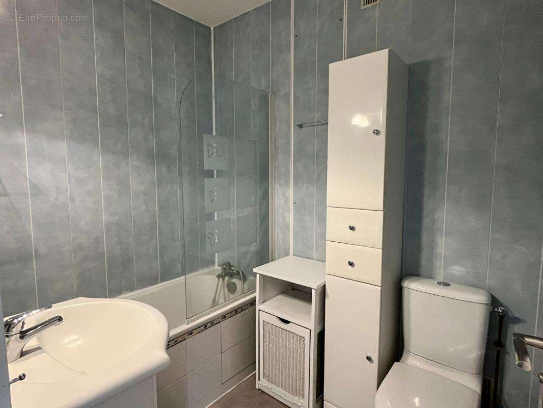 Appartement  de 111m², 3 chambres, balcon, 2 box et une cave - photo 12