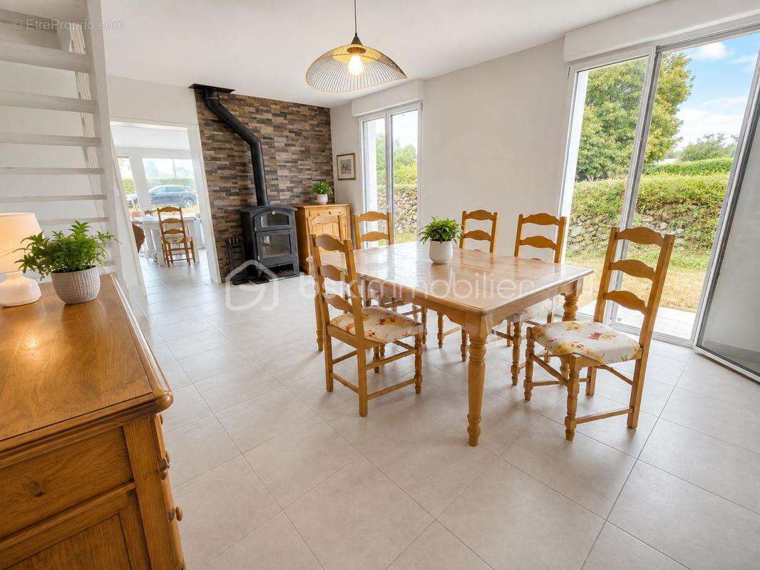 Maison spacieuse au cœur de Le Tour-du-Parc : Charme et Tranquillité - photo 4