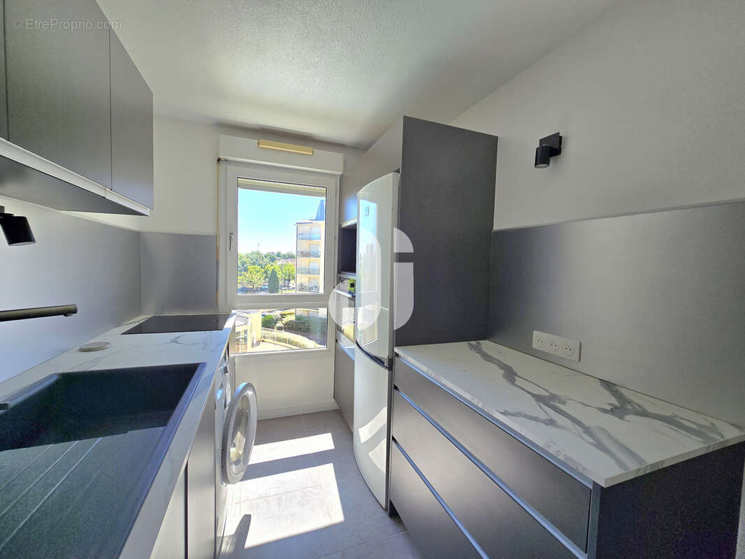 Appartement MERIGNAC ARLAC 2 pièces 49 m2 avec balcon, parking, piscine et gardien - photo 5