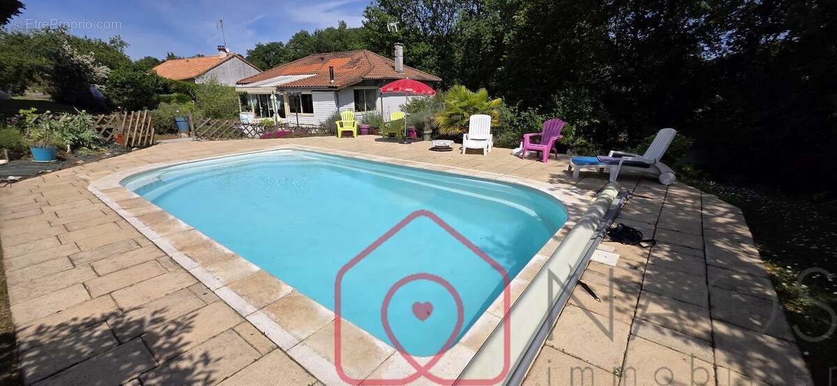 Biard: Maison de 115m² . hab.Parc arboré . Garage . Piscine - photo 9