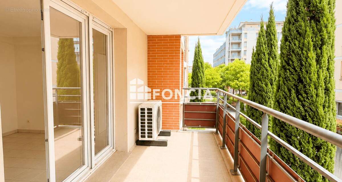 Appartement 3 pieces climatise avec terrasse et parking sous sol - photo 2