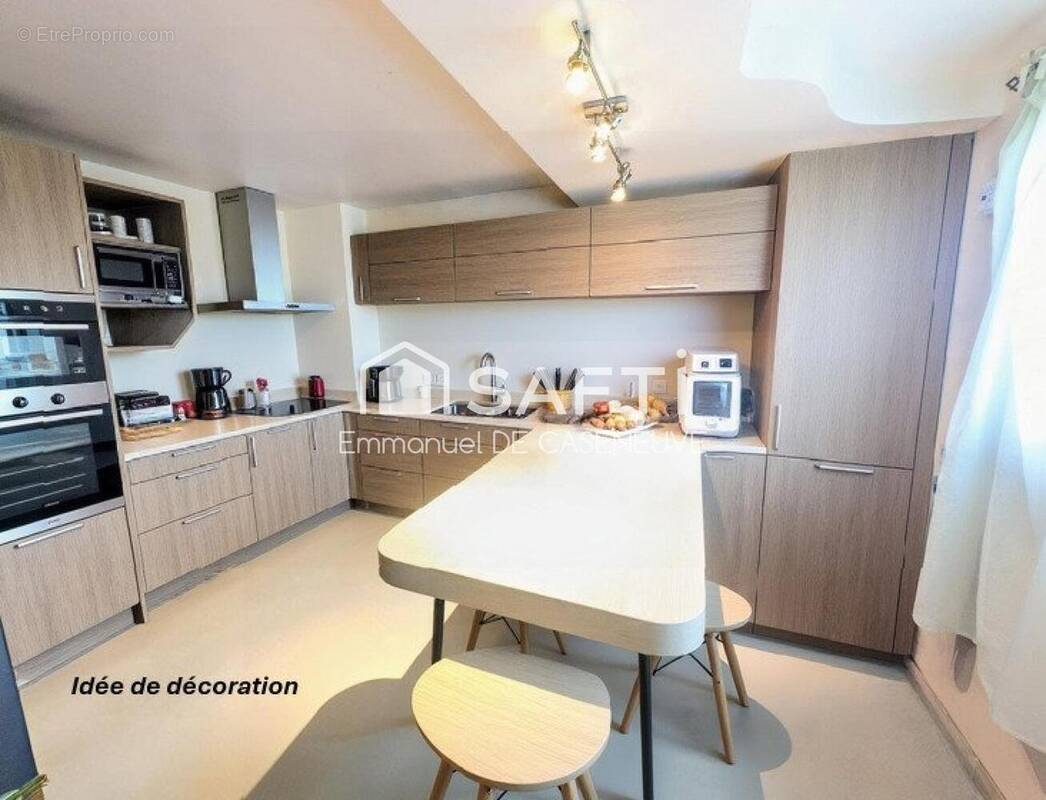 Photo 1 - Maison à LIVRY-GARGAN