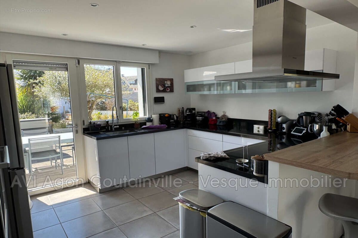 Maison à AGON-COUTAINVILLE