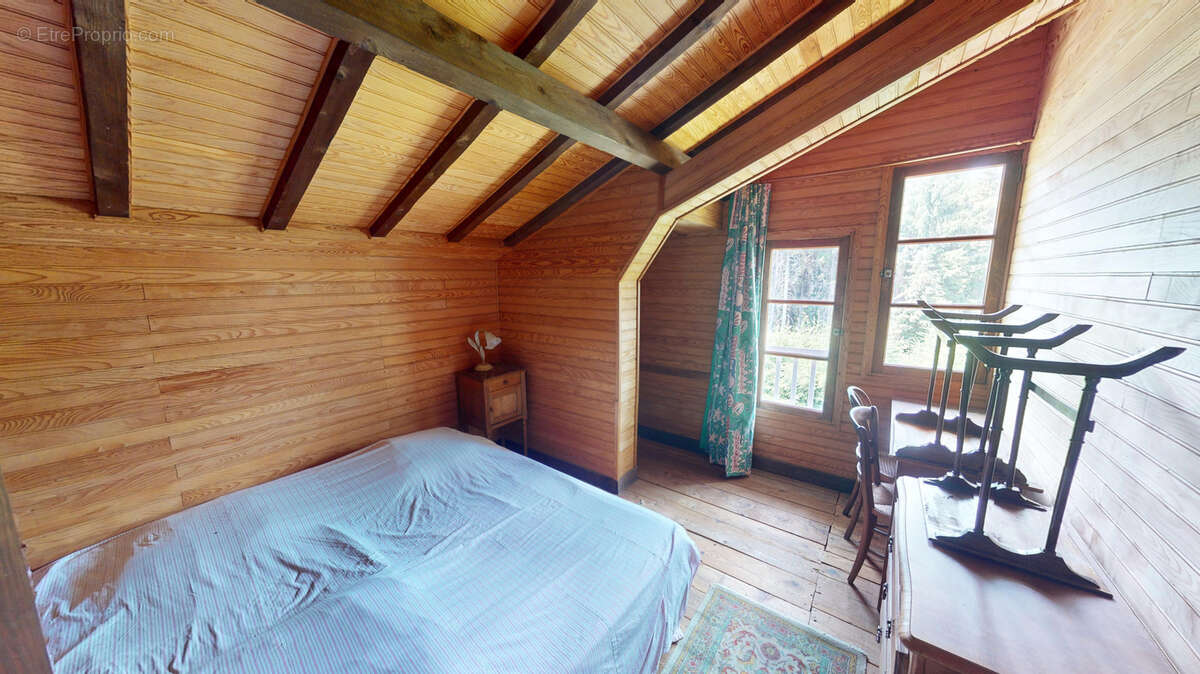 Chalet en bois sur sous sol et terrain attenant boisé - photo 22