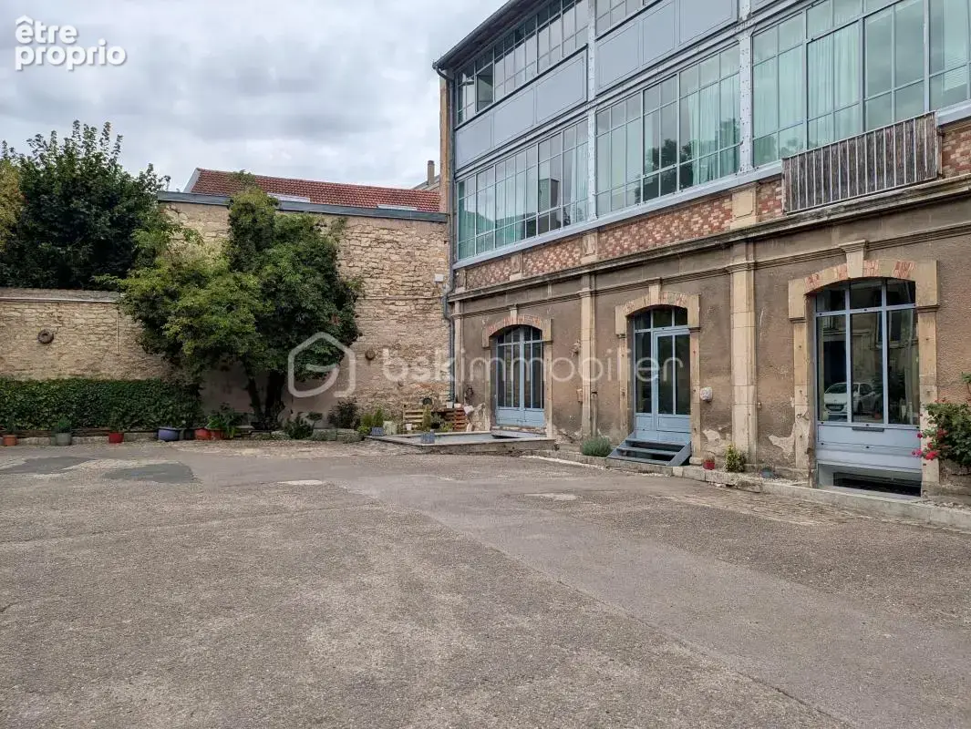 Très bel appartement type loft industriel en arrière corps de bâtiment avec parking et caves - photo 10