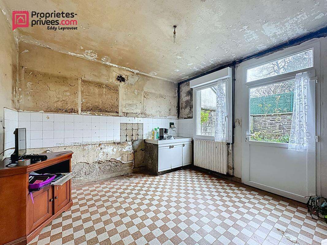 Maison à JUVIGNY-LE-TERTRE