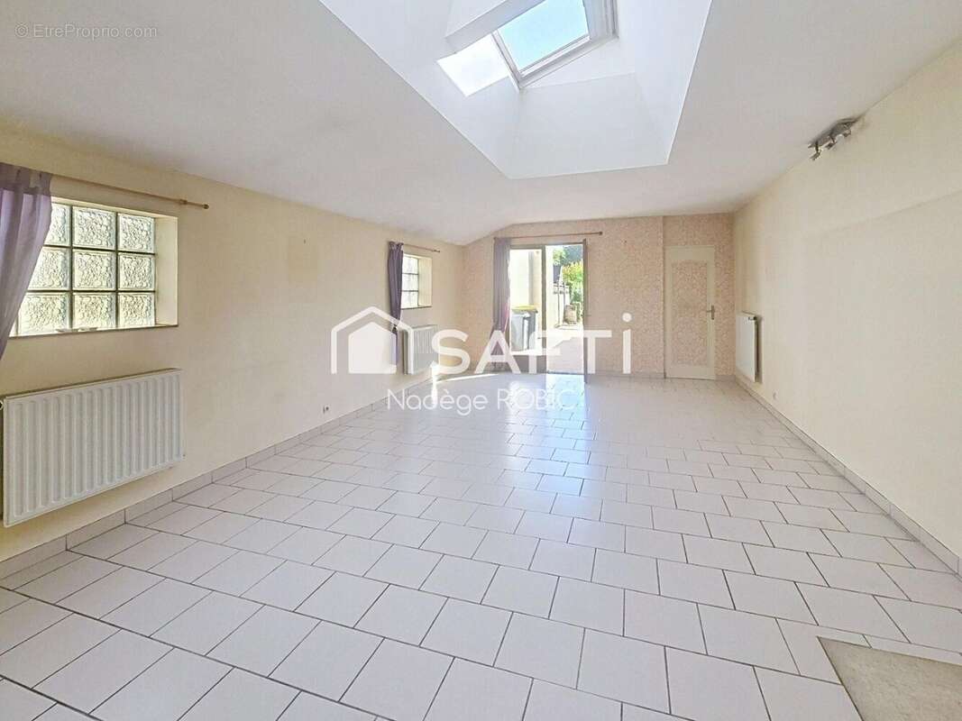 Photo 1 - Maison à SEICHES-SUR-LE-LOIR