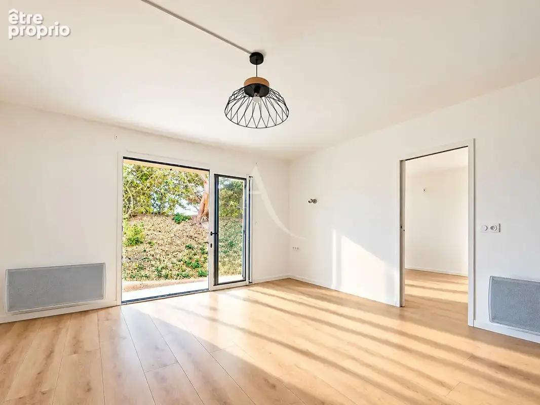 Exclusivité l'Adresse ! Appartement 2 pièces 37 m² - jardin cave et parking - photo 3