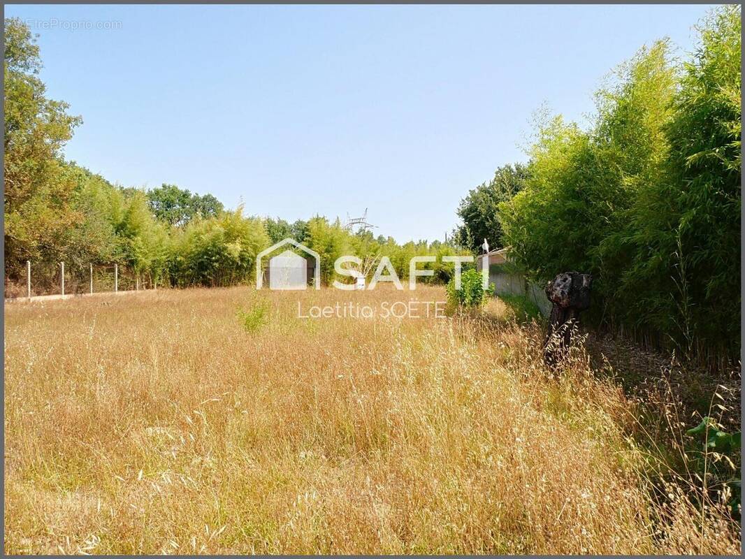 Photo 1 - Terrain à BEAUZELLE