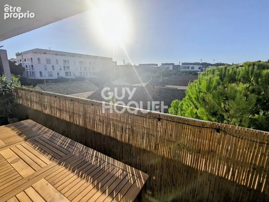 Appartement T3 Près d'Arènes 65 m2 + double terrasse + garage - photo 3
