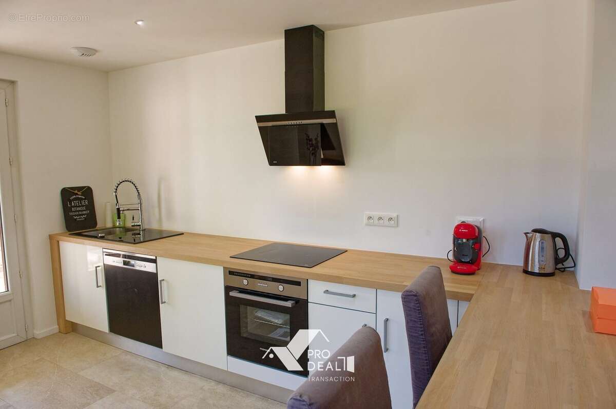 Maison à SAINT-DENIS-LES-BOURG