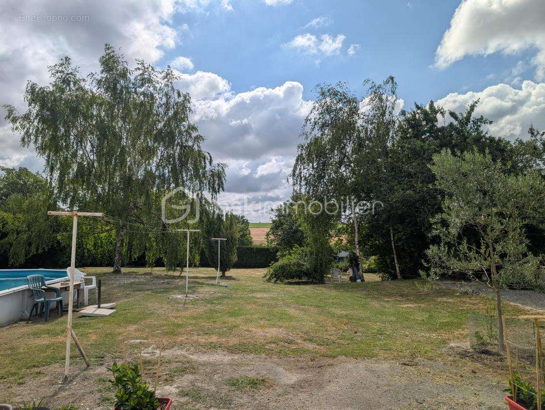 Coup de coeur assuré pour cette belle maison familiale de 149m2 sur un écrin de verdure de 1535m2 à 5 minutes de Saint-Quentin - photo 8