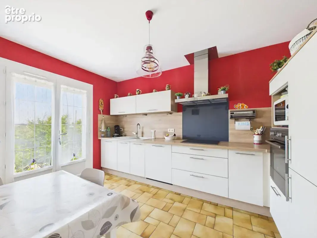 Maison de 105 m2 au coeur de Montamisé , 3 chambres, jardin, garage , grand sous sol - photo 3