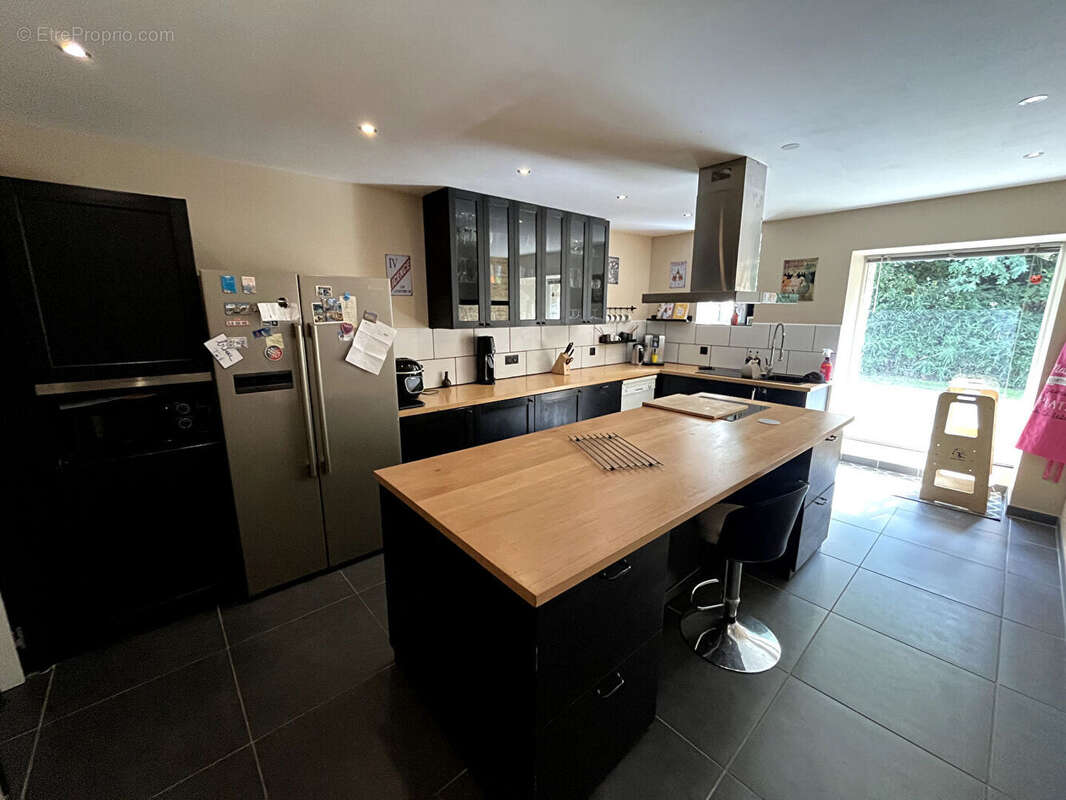 Maison à COMBOURTILLE