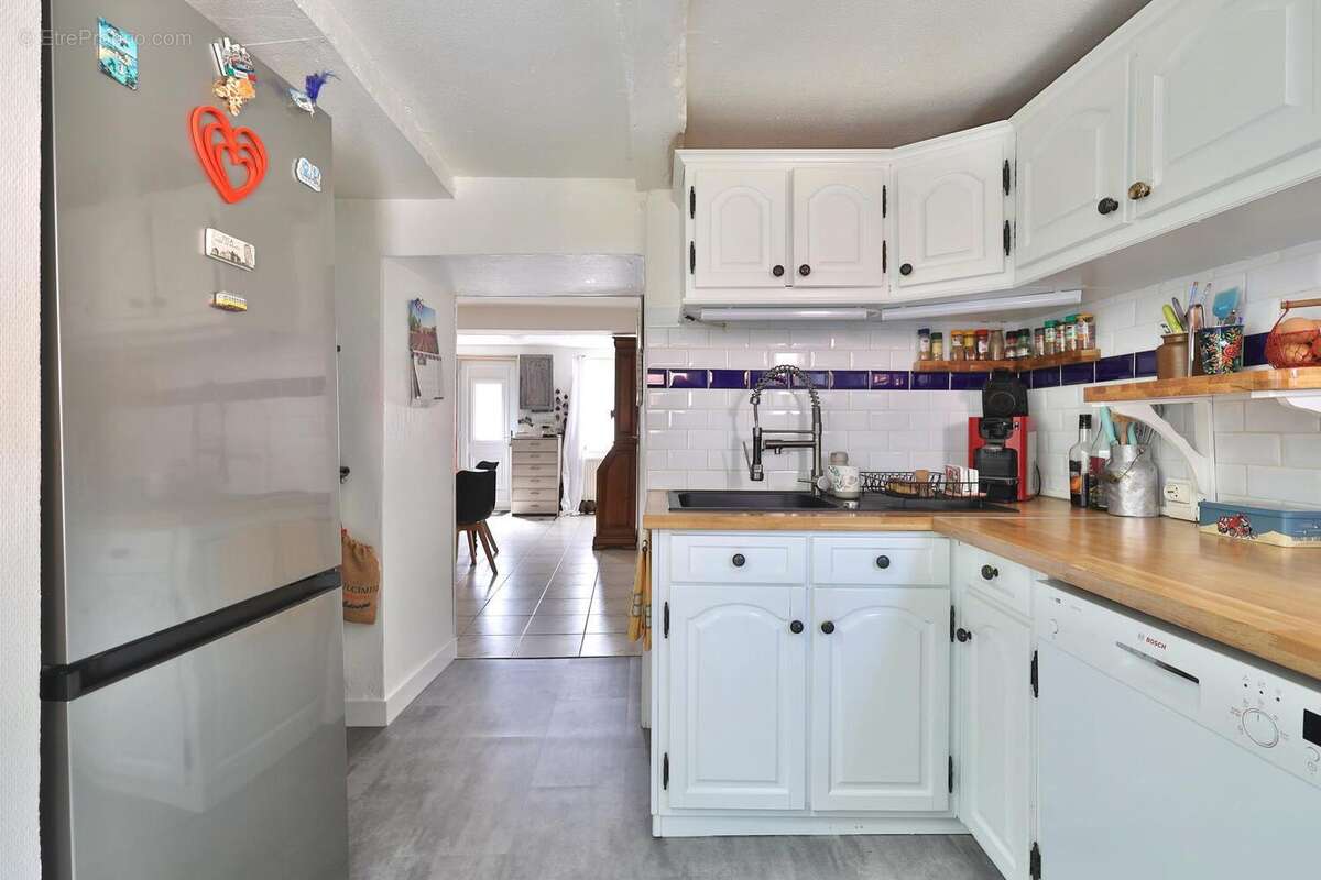 Photo 4 - Maison à SAINT-GENIS-LES-OLLIERES