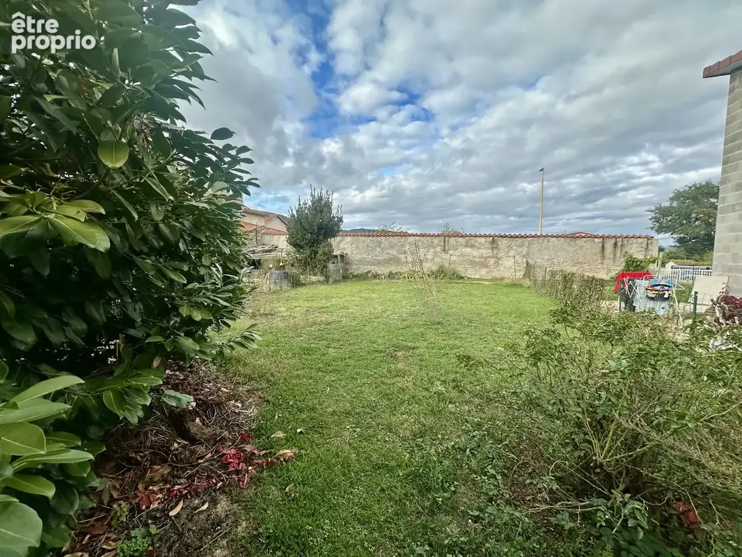 Maison de ville mitoyenne d'environ 85m2 avec terrain constructible - photo 2