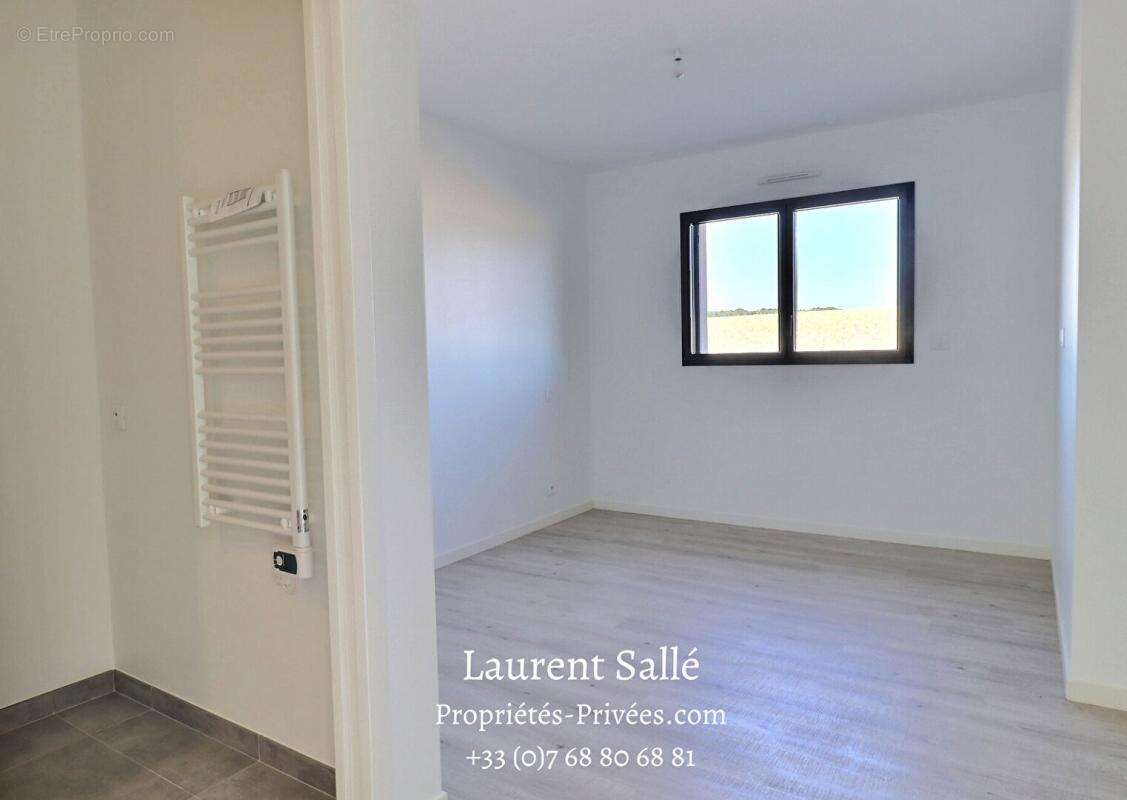 Maison neuve RE 2020 de plain-pied 125 m²  - 3 chambres - Sous-sol - Terrain 2 020 m² - - photo 7