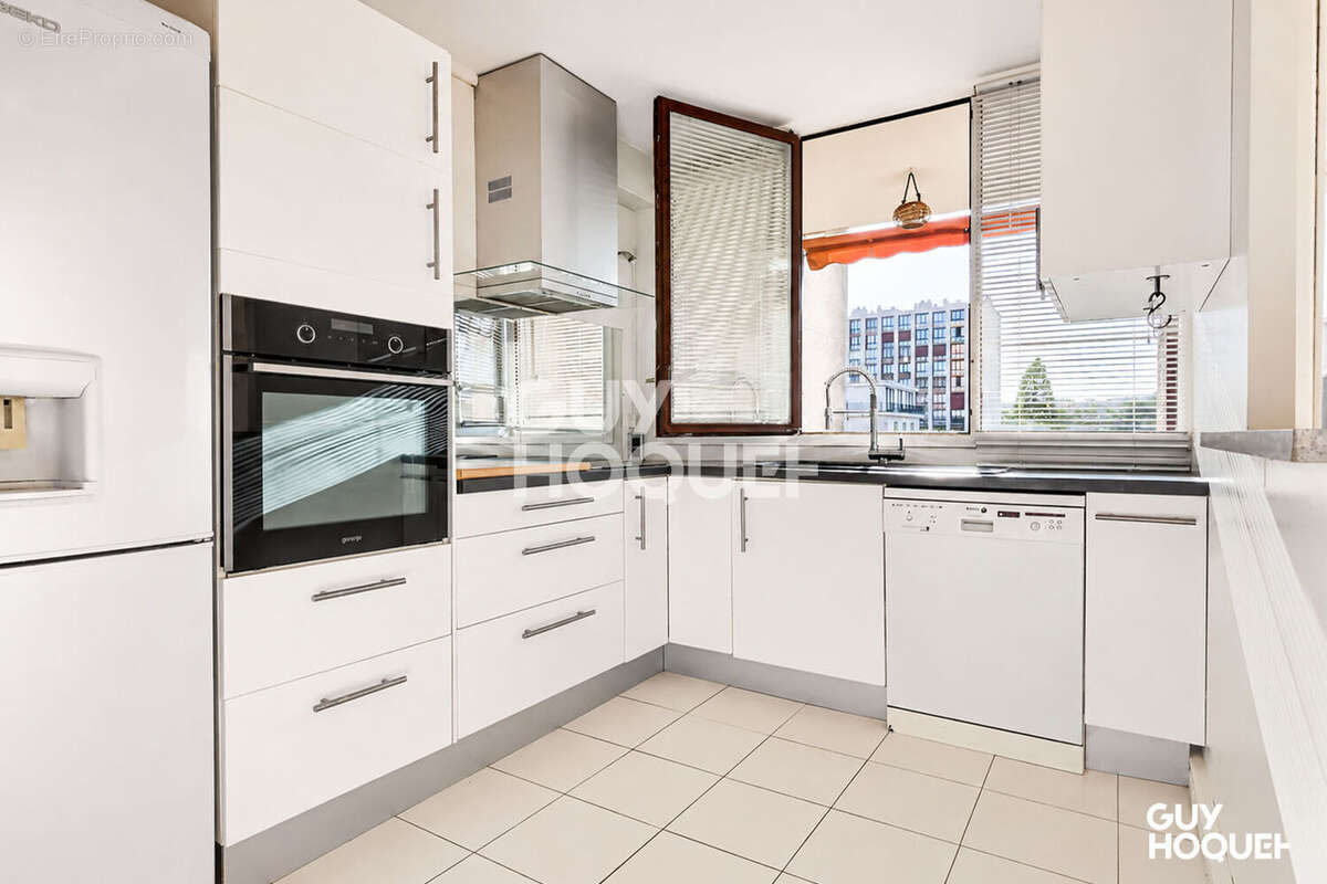 Appartement traversant de 85 m² + balcon - photo 7