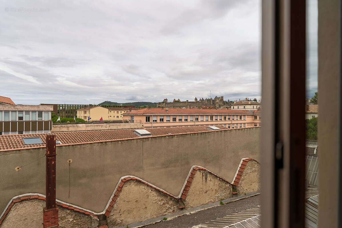 CARCASSONNE - PALAIS - GAMBETTA Appartement T3 99 m² avec vue Cité, cave et possibilité de garage - photo 8