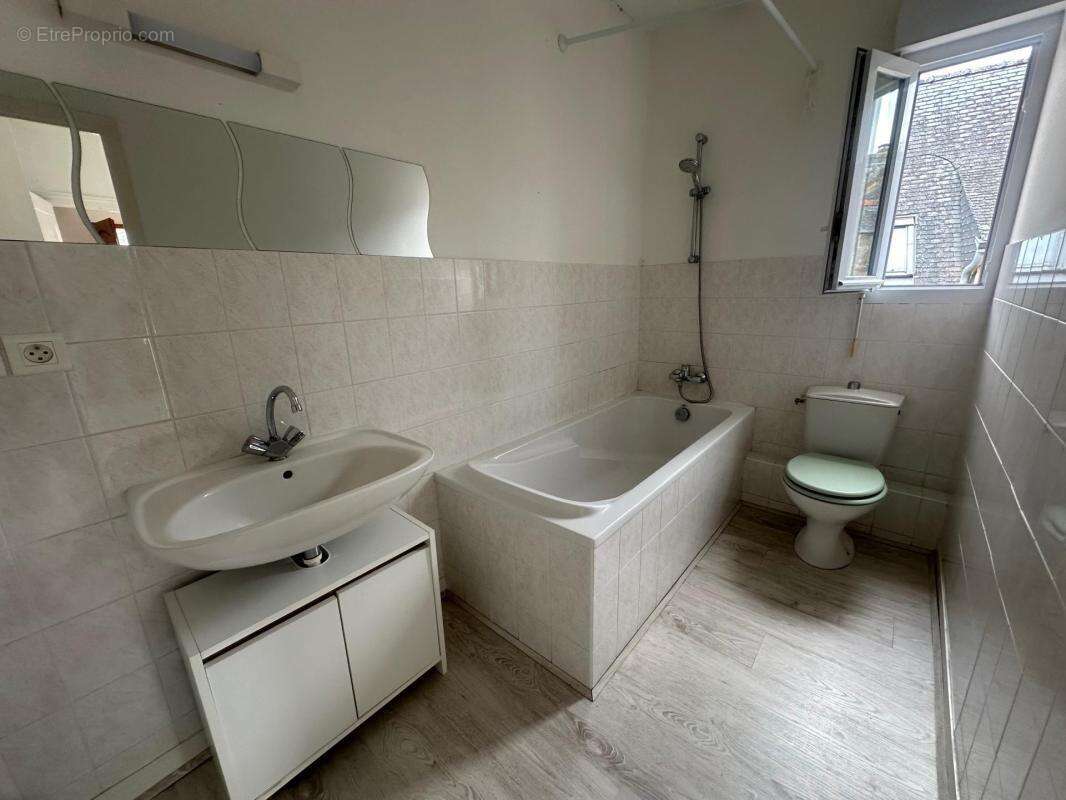 Maison de bourg avec rapport locatif - photo 10