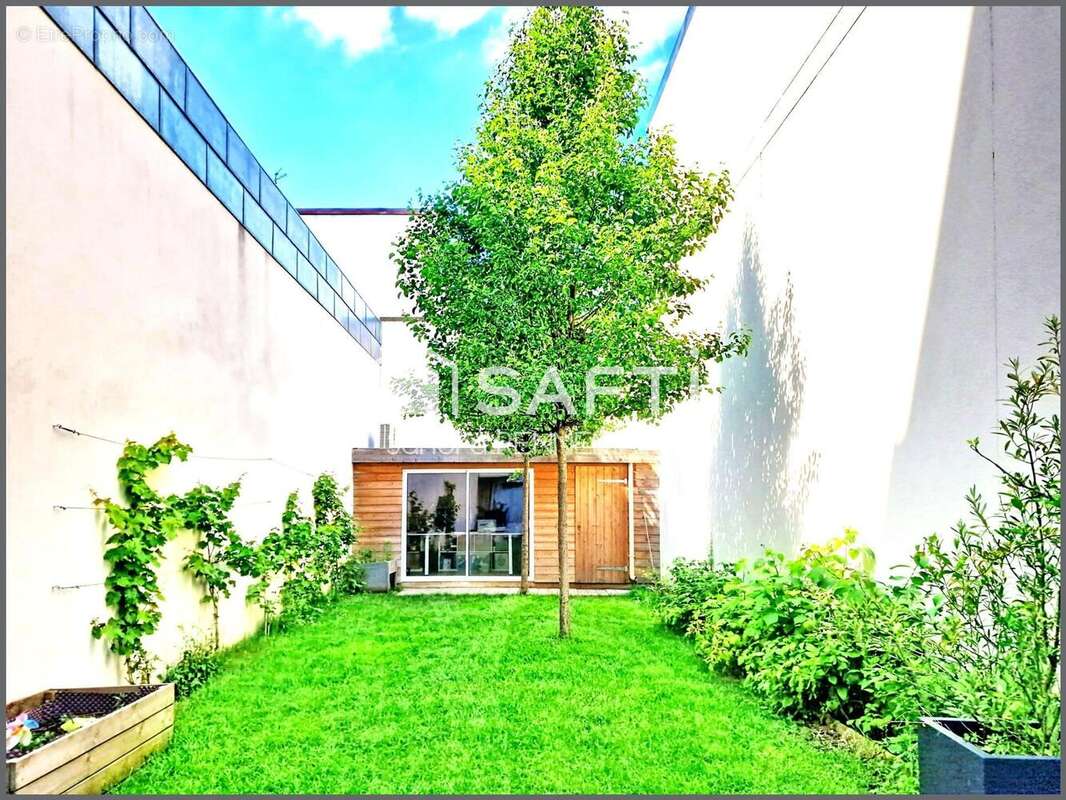 Photo 5 - Appartement à COURBEVOIE