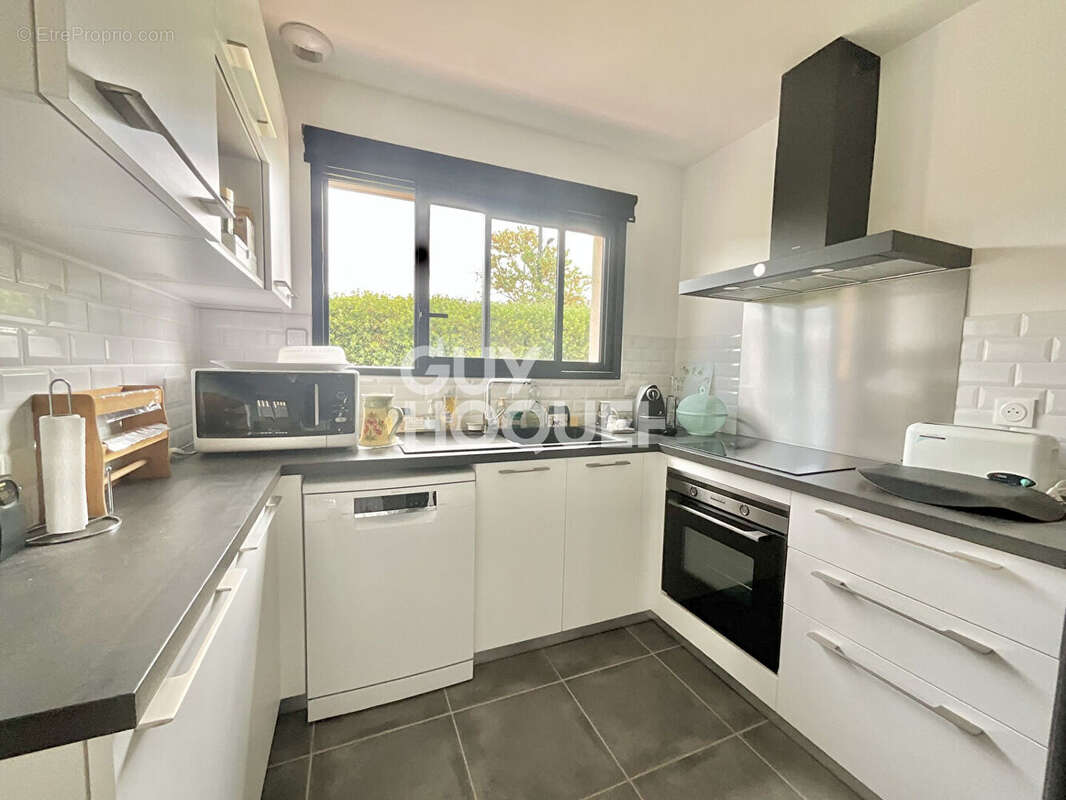 Maison de plain-pied T4 de 88 m2 sur une parcelle de 550 m2 - photo 9
