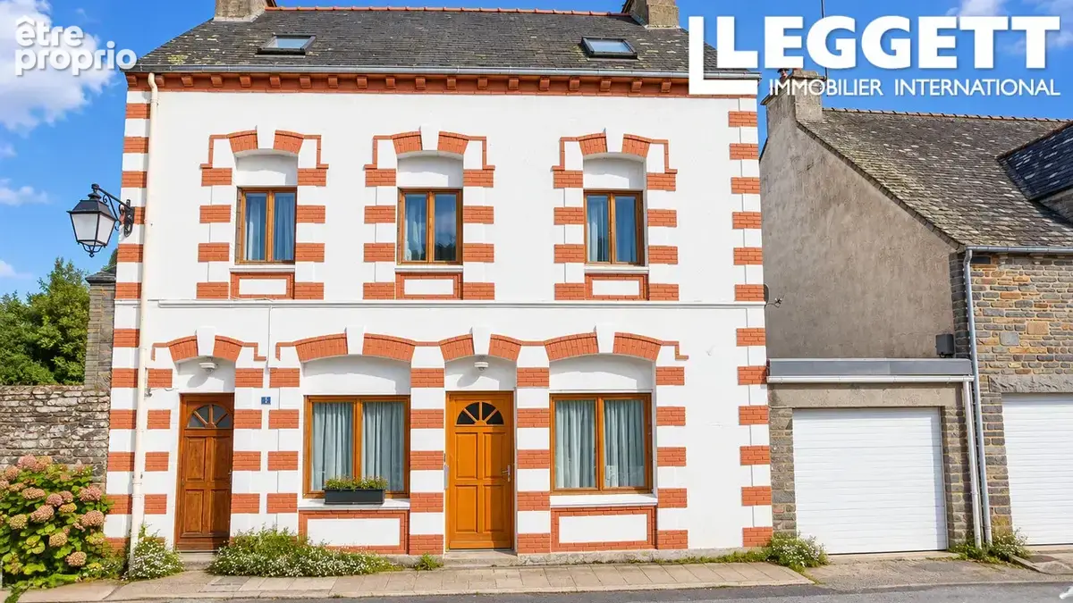 Belle propriété de 3 appartements au cœur de Gouarec, proche du canal, offrant de multiples possibilités - photo 1