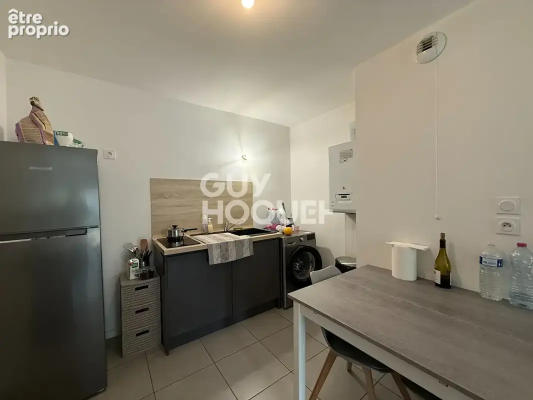 Appartement Givors 2 pieces de 41.88 m2+parking+rez de jardin VENDU LOUE - photo 4