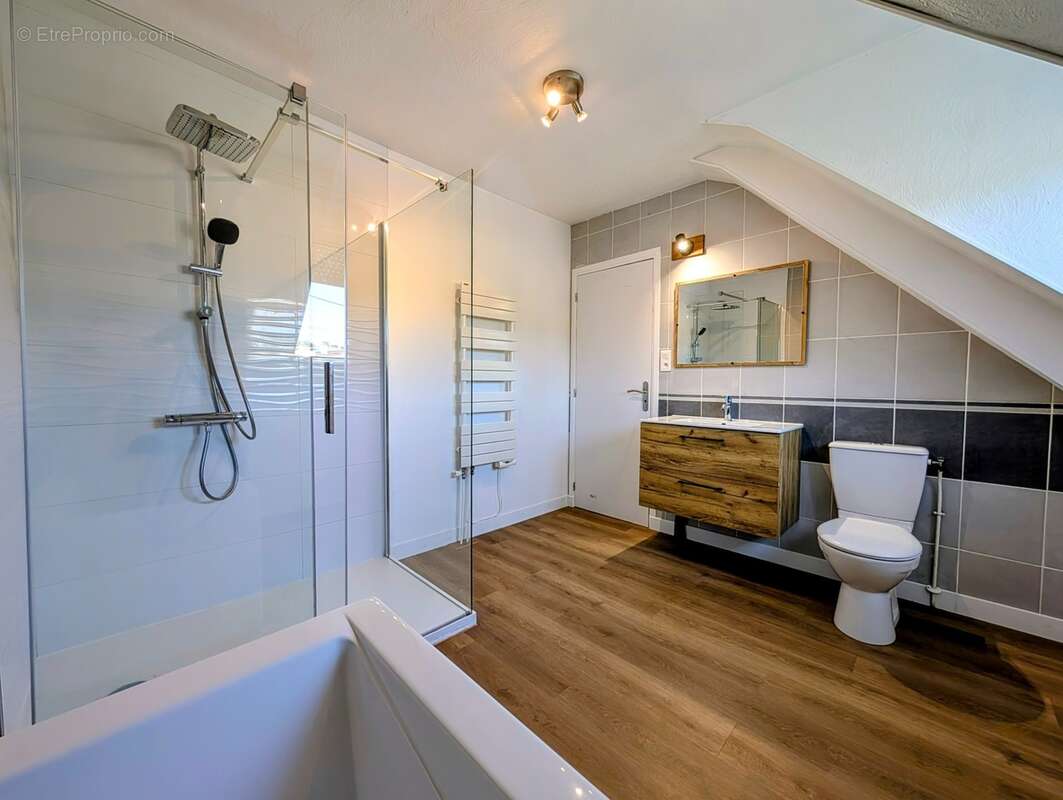Le Douvez - Maison habitable sans travaux - 3 chambres - sous sol intégral et combles aménagés - GUIPAVAS (29) - photo 9