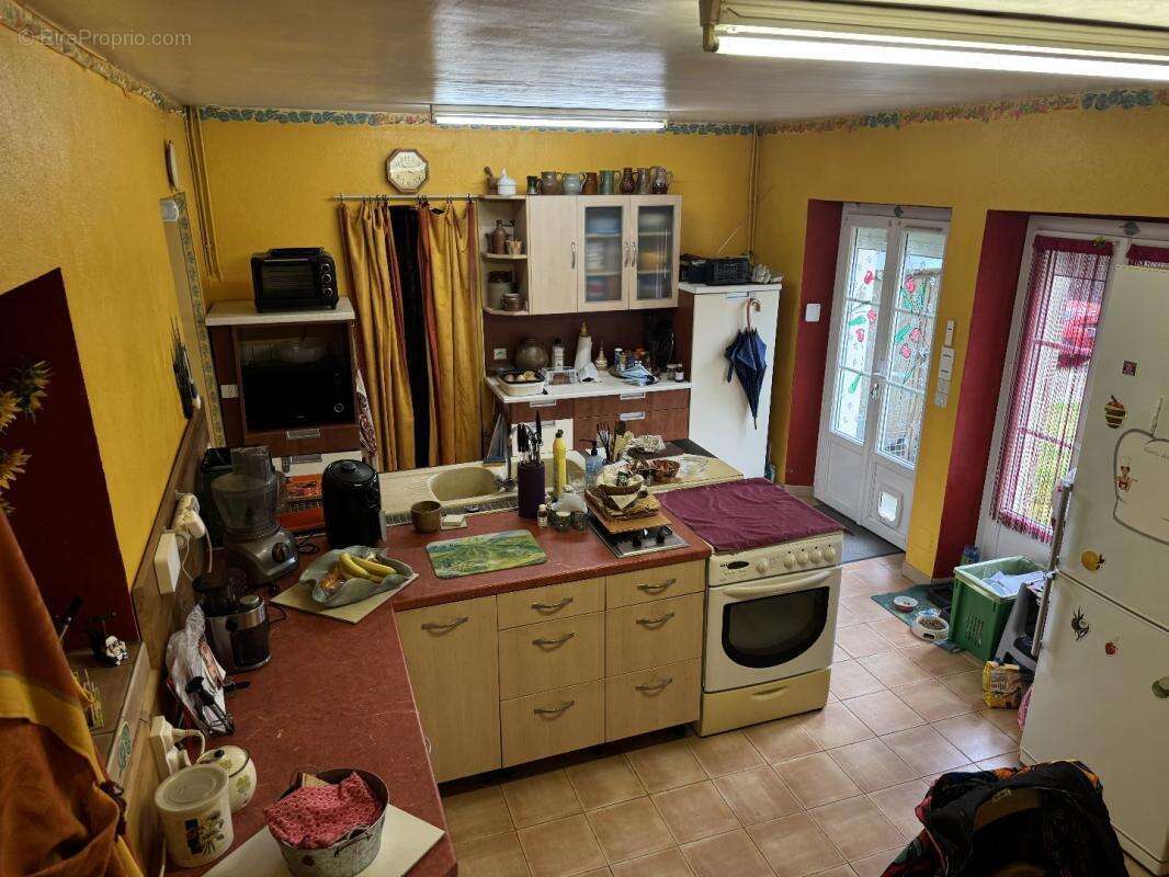 Maison à FONTGOMBAULT