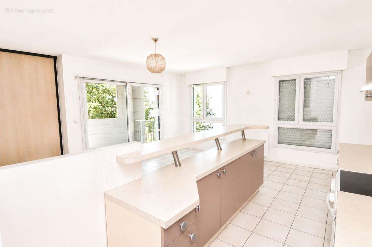 Appartement T2 de 48 m2 avec balcon, parking couvert et envi - photo 4