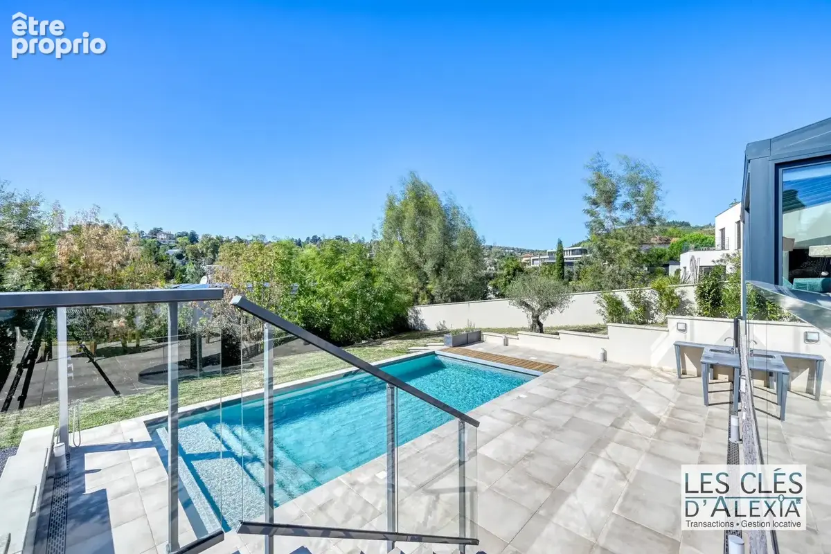 Saint-didier-au-mont-d’or — somptueuse maison contemporaine avec piscine  203 m²  terrain 2 134 m² - photo 6