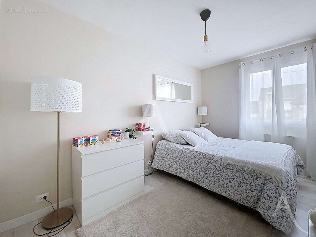 Maison de plain-pied 4 pièces avec sous-sol total et terrain de 650 m² à Rosny-sur-Seine - photo 5