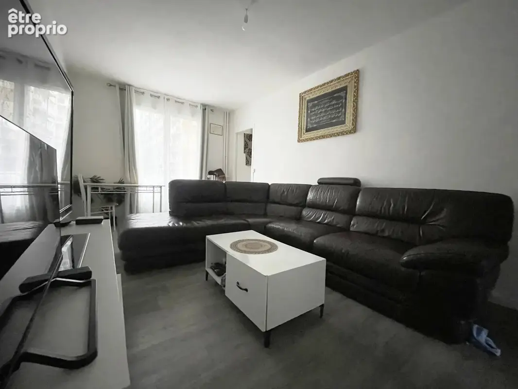 Appartement T4 avec balcon et cave - photo 3