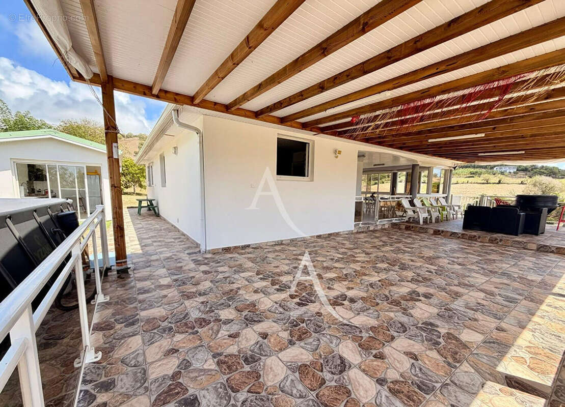 En EXCLUSIVITE: maison T4 + dépendance avec piscine au VAUCLIN. - photo 12