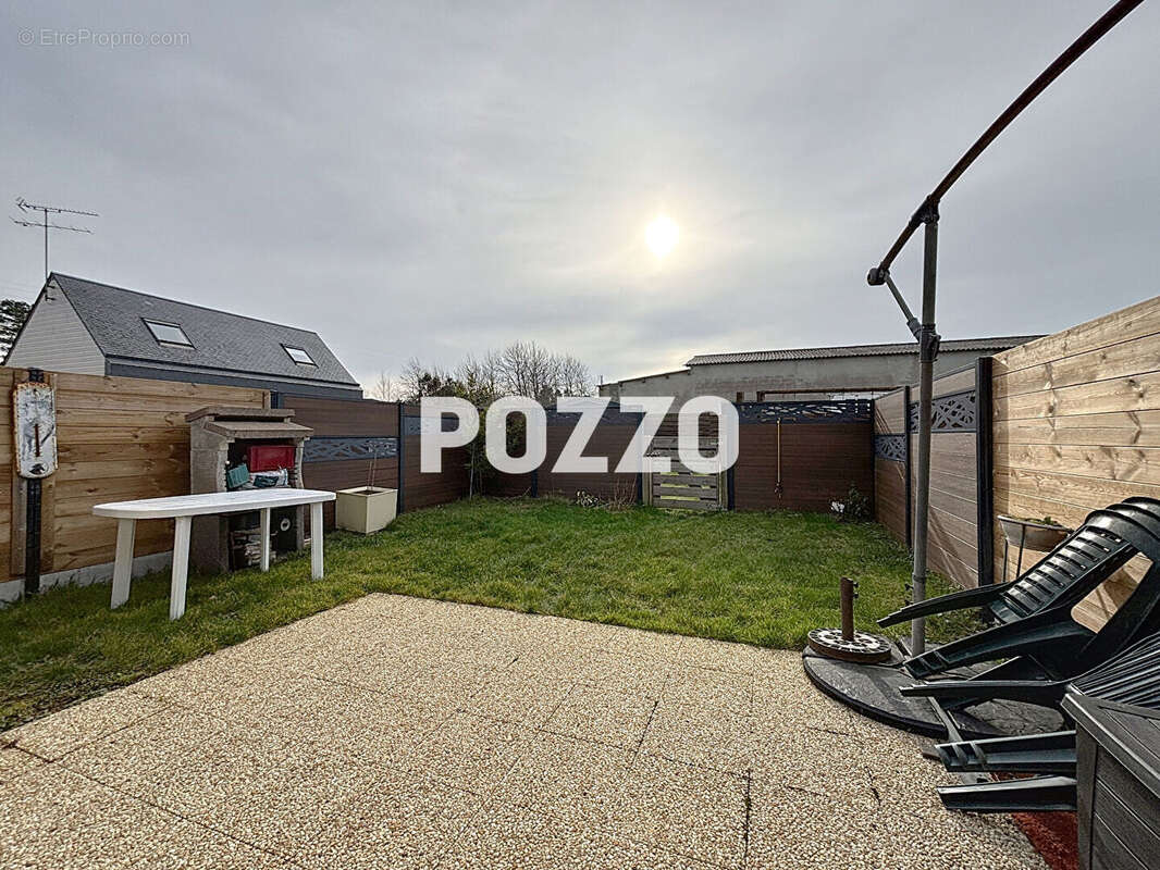 Maison à AGON-COUTAINVILLE