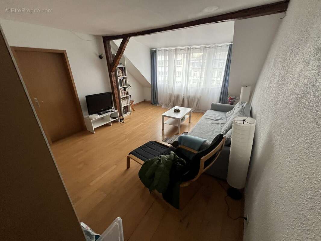 séjour autre depuis l'escalier - Appartement à STRASBOURG