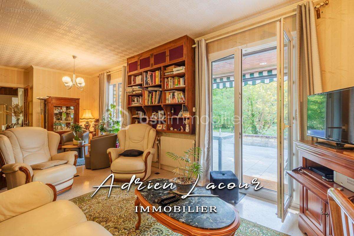 Jolie maison sur sous-sol avec son parc arboré - photo 9