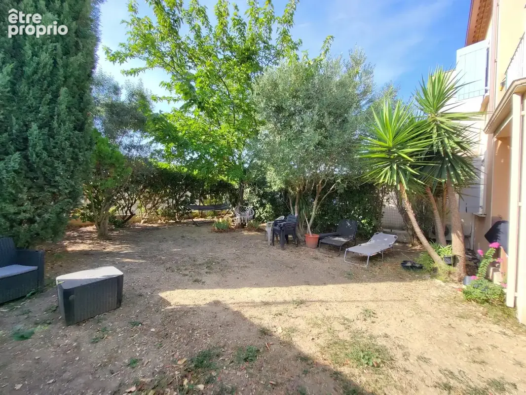 A vendre -  appartement de plain pied avec jardin et 2 place - photo 3
