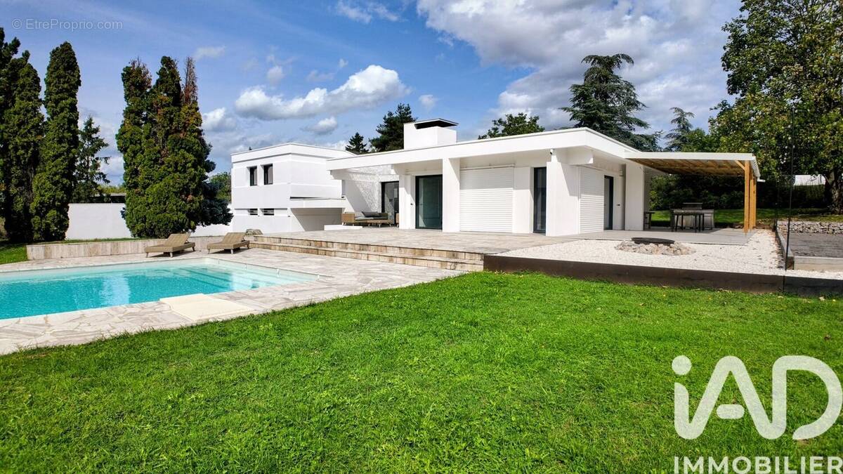 Photo 1 - Maison à SURY-LE-COMTAL