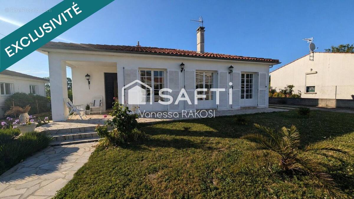 Photo 1 - Maison à SAINTES