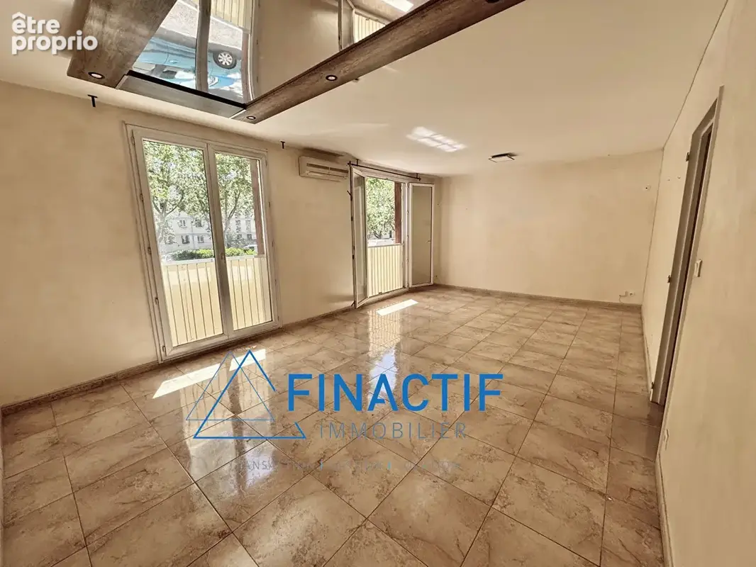 Appartement Type 3/4 - 73,41 m2 - Cave - Garage fermé - photo 4