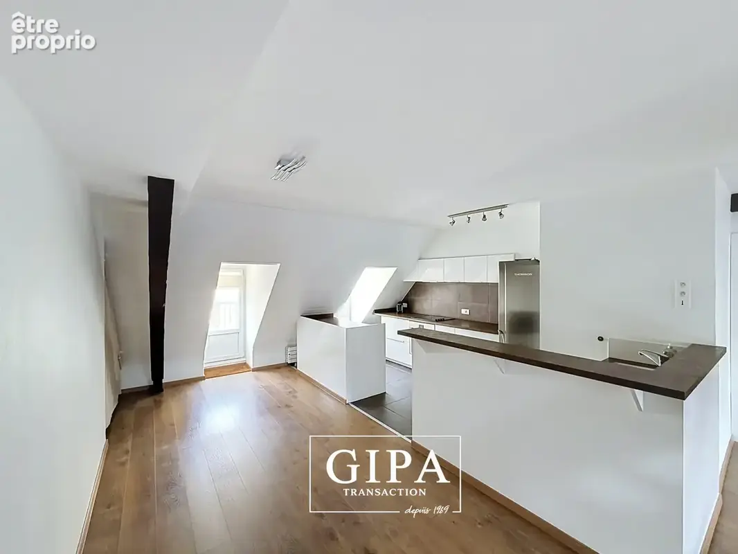 Le charme de l'ancien au sommet : duplex avec terrasse à l'Orangerie - photo 3