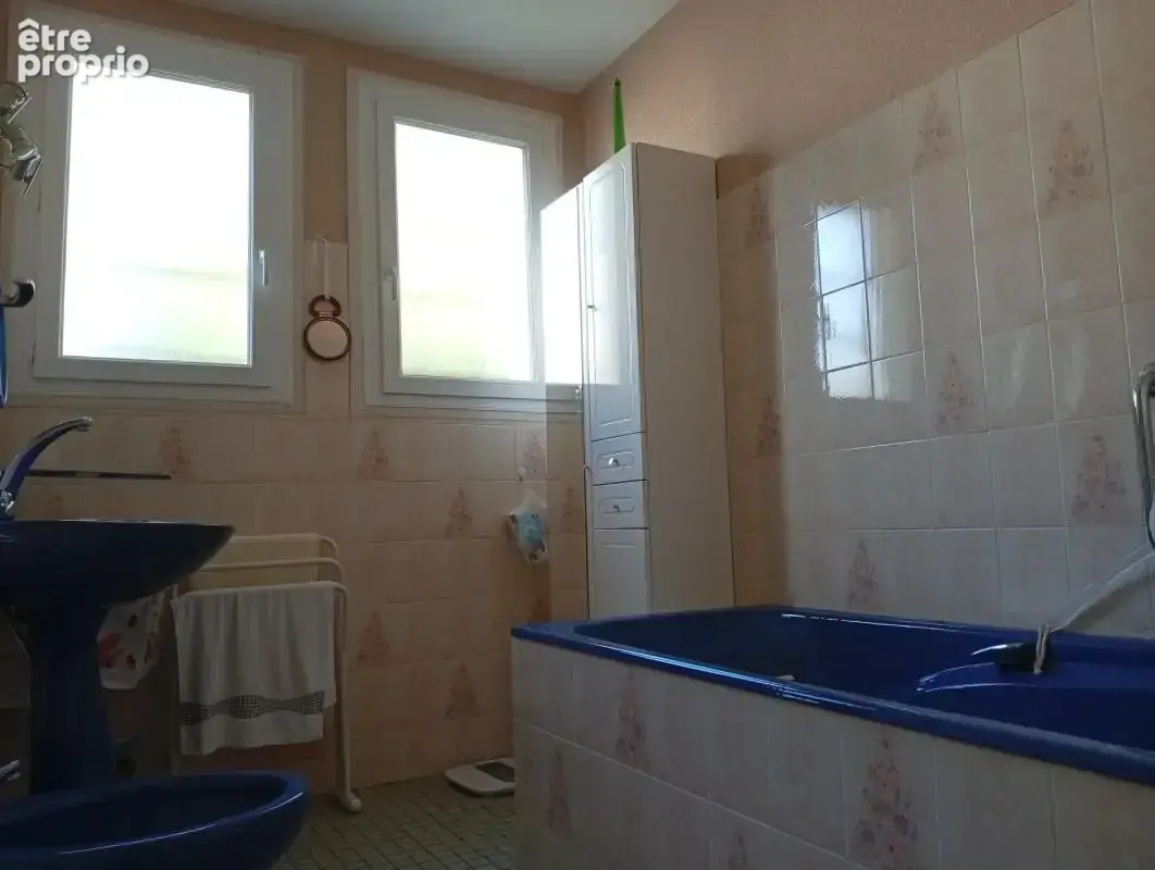 Maison mitoyenne de 85m² avec jardin et sous-sol - photo 15
