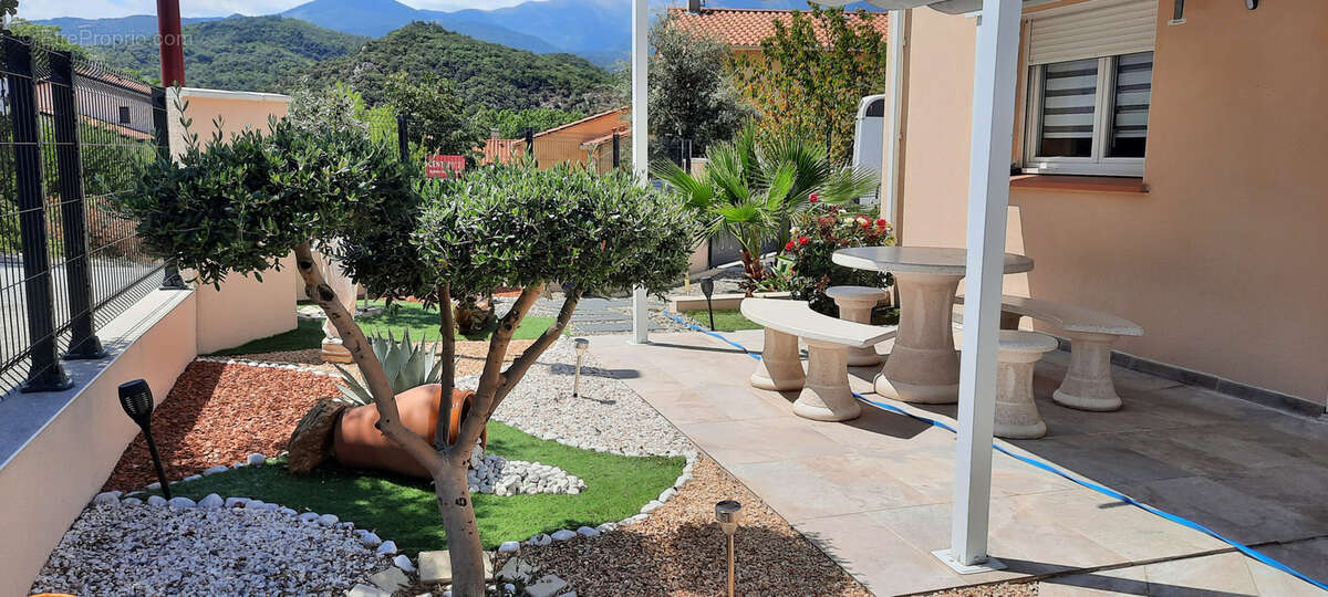Plain-pied. re2020.terrasse.piscine. 66. vue canigou .terrasse - photo 12