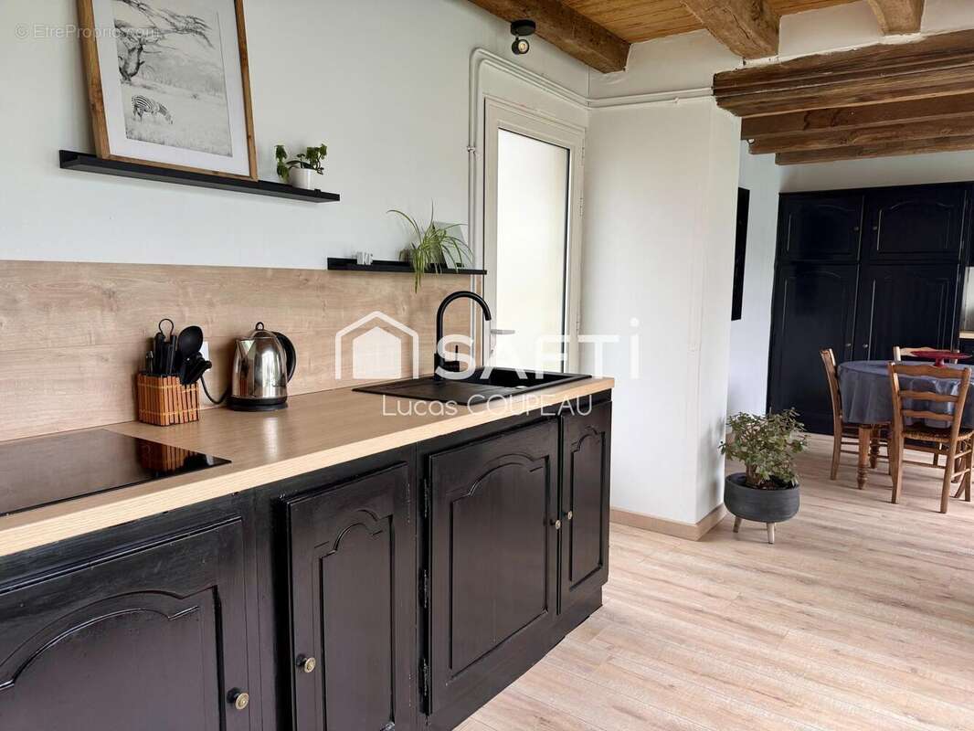 Photo 4 - Maison à SOULAIRE-ET-BOURG