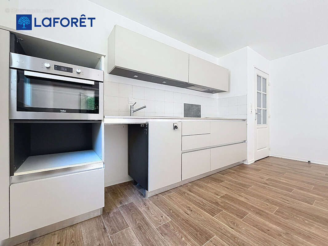 Au Centre de Guidel, Appartement 68m²,  2 chambres, terrasse, jardin, 2 stationnements - photo 6