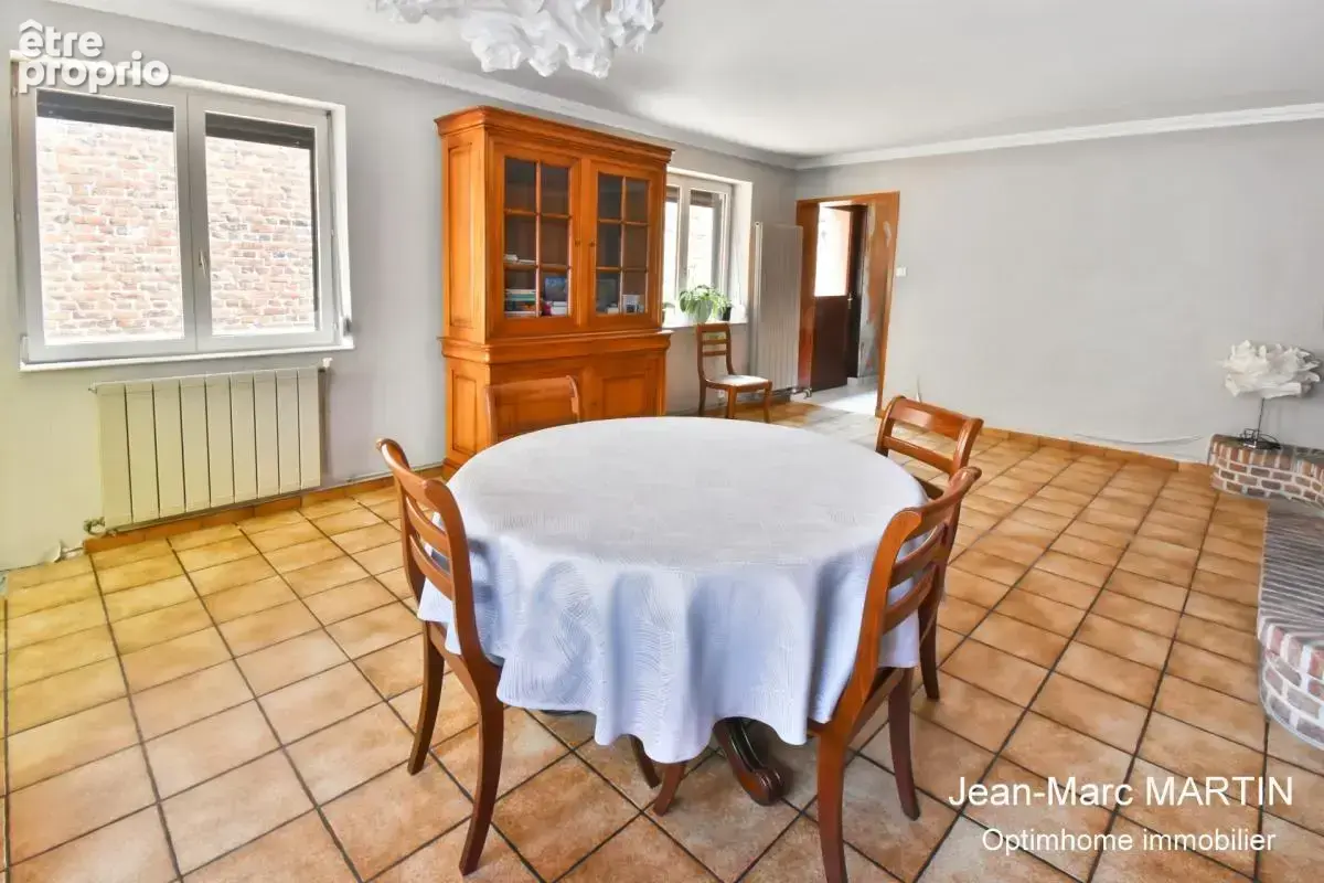 Maison familiale de 115 m² à Carnin : luminosité, 3 chambres et potentiel de valorisation - photo 4